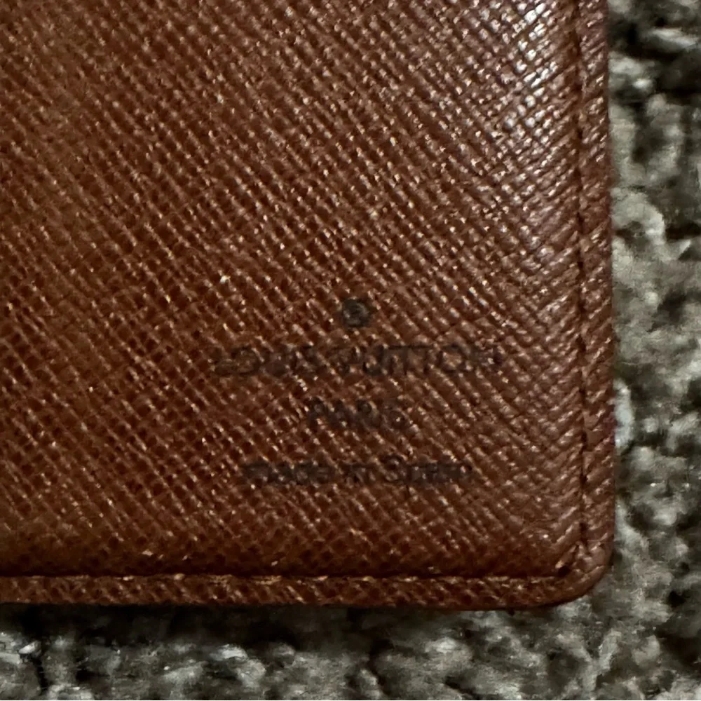 Louis Vuitton Bi fold Brown Wallet